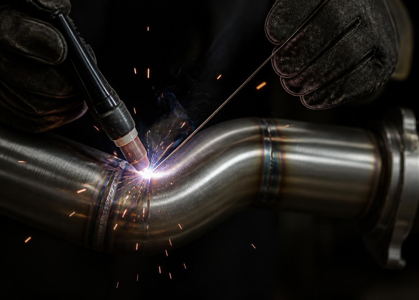 Stainless exhaust tubing being welded